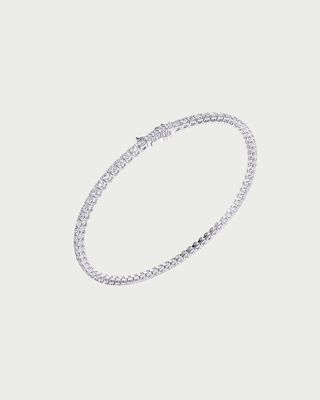 solo product shot of 18k white gold lab grown diamond tennis bracelet on off-white background